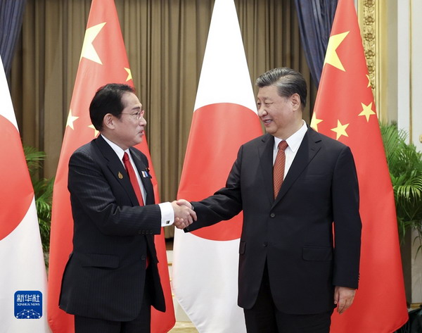 习近平会见日本首相.jpg