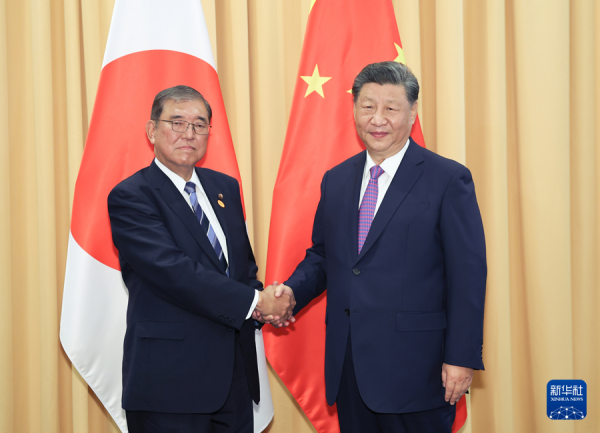 习近平会见日本首相.png