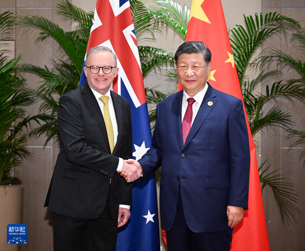 习近平会见澳大利亚总理.png